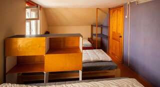 Гостиница Хостел Маверик Иркутск Односпальная кровать в 4-местном общем номере для мужчин и женщин-4